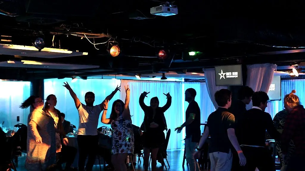 Guests dancing at a corporate end-of-year party